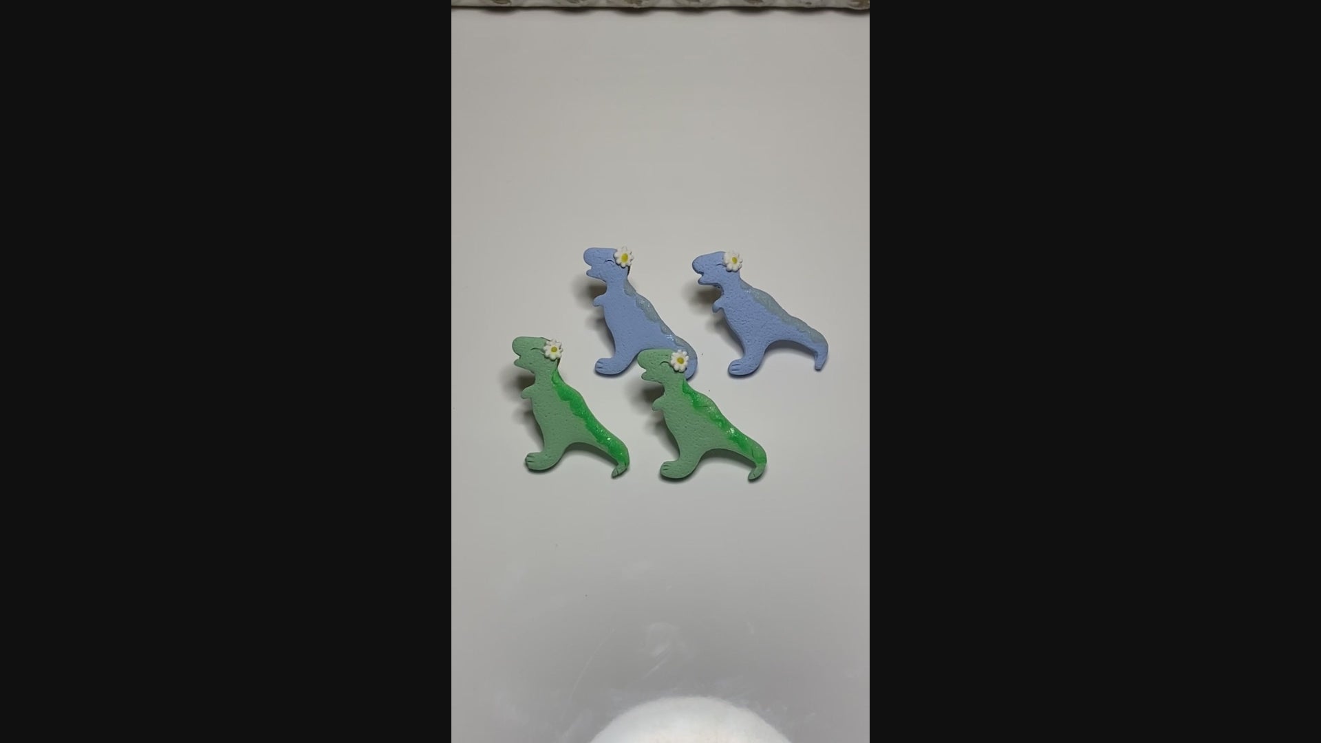 Glowing T-Rex Studs